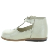 Gold leather dress shoes for a baby