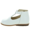 White dress shoes for a baby girl 