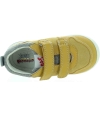 Yellow supportive sneakers for a toddler 