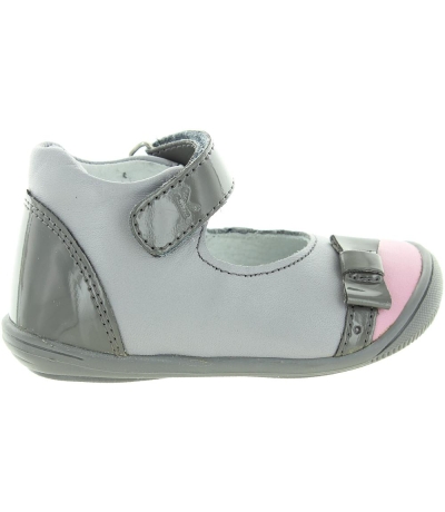 Special gray shoes for a toddler girl with high arches
